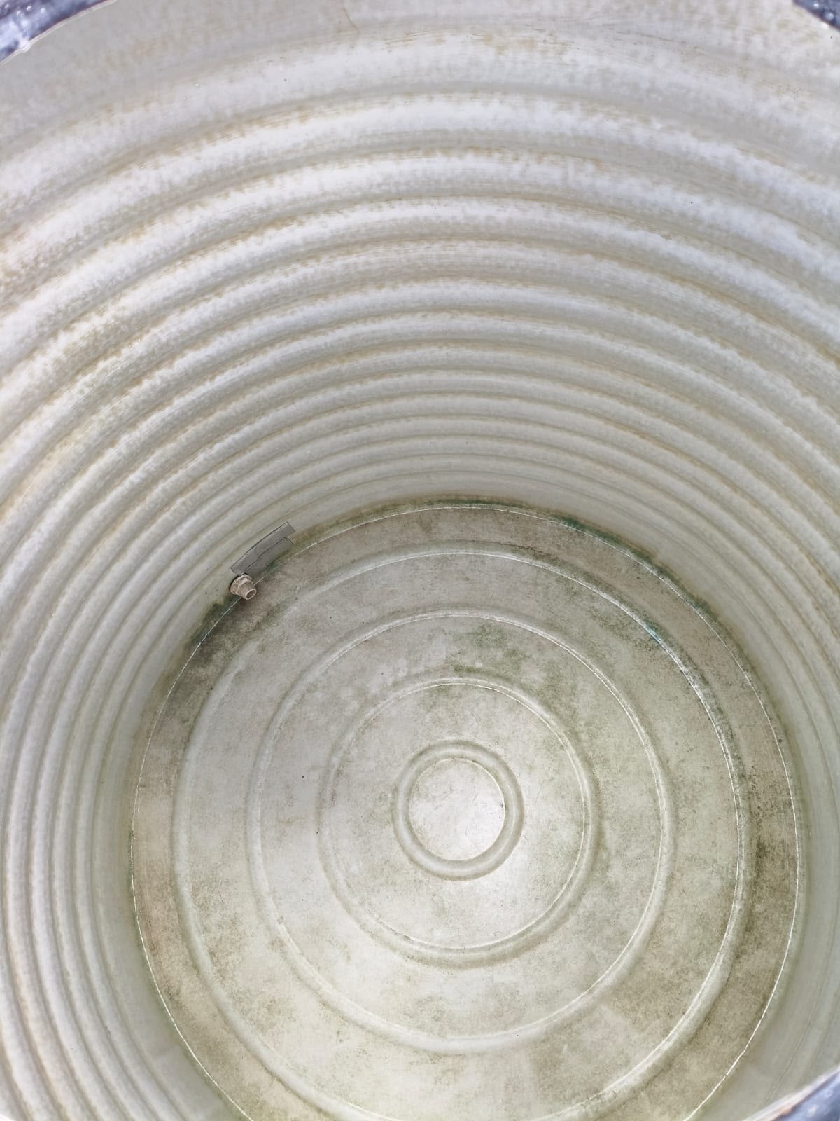 Clean plastic water tank interior after cleaning work